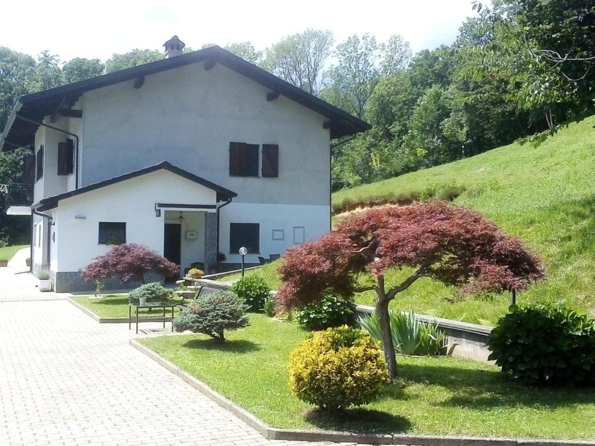 Appartamento La Casa Nel Bosco Rueglio ภายนอก รูปภาพ